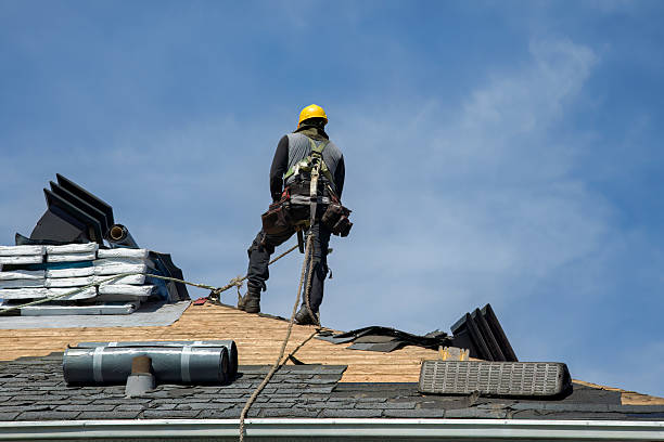 Professional Roof Replacement technician working in New Pine Creek, OR